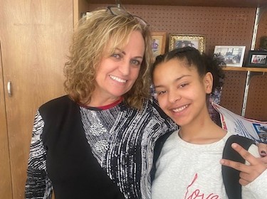 Janet Routzong with student